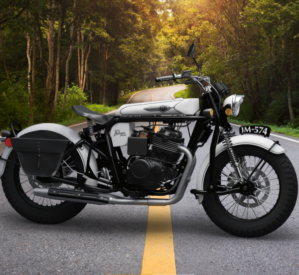 Vintage motorcycle parked on a forest roadside.